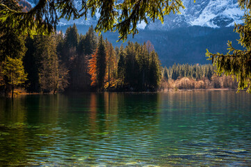 Morning in the Fusine lakes valley. Autumn reflections.