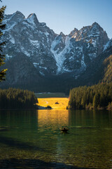 Morning in the Fusine lakes valley. Autumn reflections.
