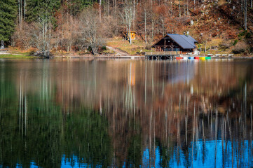 Morning in the Fusine lakes valley. Autumn reflections.