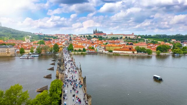 Panoramic time lapse view of the cityscape of the old town of Prague, Czech Republic, during a bright summer day