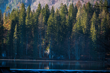 Morning in the Fusine lakes valley. Autumn reflections.