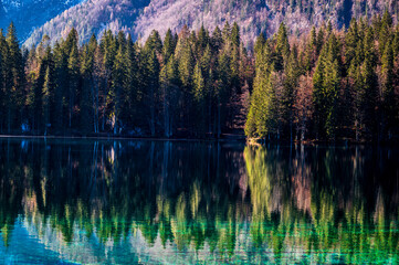 Morning in the Fusine lakes valley. Autumn reflections.