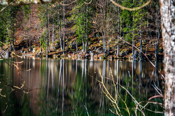 Morning in the Fusine lakes valley. Autumn reflections.