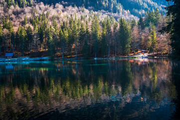 Morning in the Fusine lakes valley. Autumn reflections.