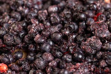 various blueberries after freezing are on the table