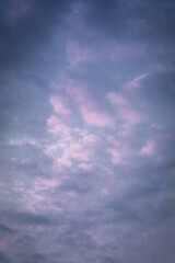 purple-lilac clouds in the blue sky during sunset