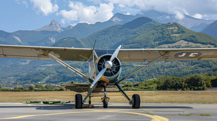 A small, two-passenger plane is parked on the ground at an airfield in Senago, Italy. The plane is being serviced.