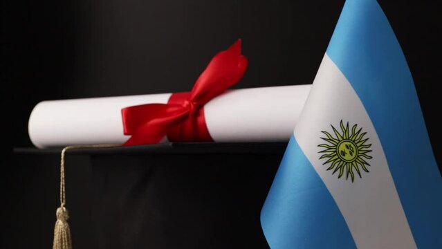Argentinian education and language learning, graduation cap with diploma and flag of Argentina, student celebrates global learning achievement