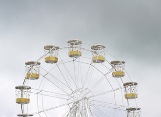 Empty ferris wheel with yellow color at the park