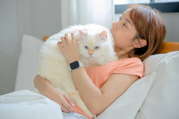 girl and Persian cat