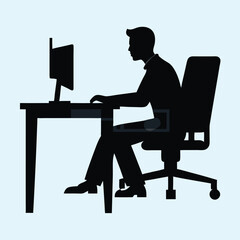a businessman sitting on an office chair at a table, working on a computer. vector silhouette
