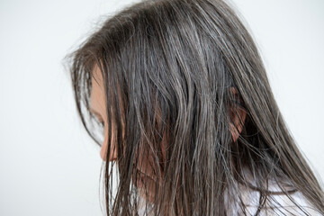 Disregarded appearance woman with careless long brown oily hair, self-neglect and lack personal...