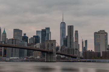 Brooklyn bridge and new york skyline view at sunset time