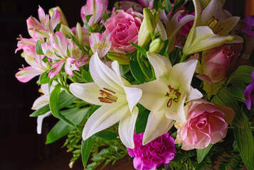 Flowers, bouquet and studio for abstract nature, textures and decoration on black background. Plants, leaves and gift or floral present for wallpaper, arrangement and petals for botany or bloom