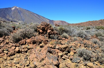 Scenic view of volcanic rock formations in desert during sunny day, Teide National Park, Tenerife