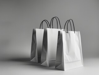 Three White Shopping Bags