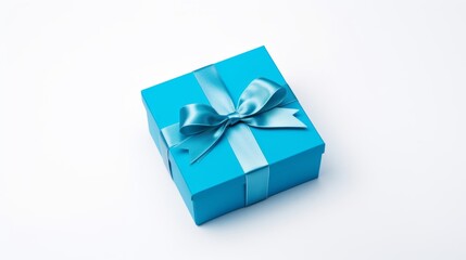 Obraz premium Elegant Blue Gift Box with Satin Ribbon on White Background