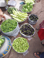 Fresh colorful vegetables in Indian street grocery market.