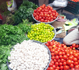 Fresh colorful vegetables in Indian street grocery market.