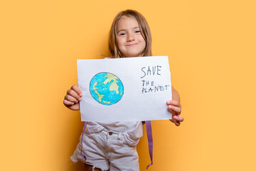Young girl holding a Save the Planet sign