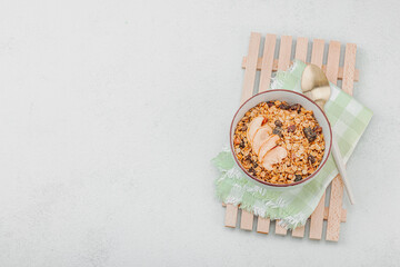 Vegan bowl with cereal granola with dried fruits. Ready to eat food, healthy breakfast concept