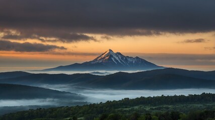 a misty mountain in the early morning with the first