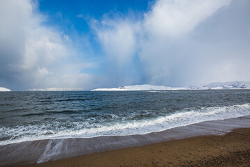 Shore near Teriberka, Barents Sea bay. Kola Peninsula landscape. Russia