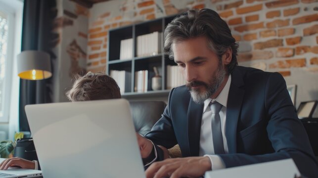 A person working on a laptop in a office or home setting, ideal for business and technology concepts