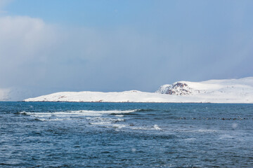 Winter Barents Sea near Teriberka. Kola Peninsula landscape. Russia