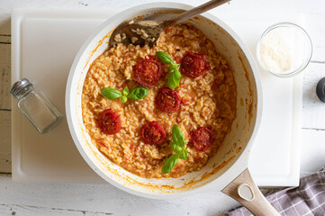 Homemade delicious tomato risotto in a skillet. Delicious italian rice dish