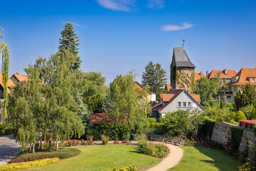 City wall with tower and park in the old city of Wernigerode, Germany