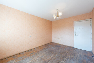 Living room in bad condition in an abandoned building. Abandoned house interior. Dirty Room. Old...