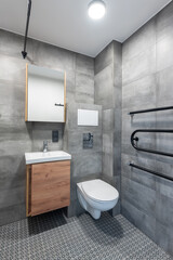 Bright Elegant Modern Minimalist Bathroom Interior Design of Shower Room With White Sink. Bathroom Accessories, Gray Tile Walls, Mirror, Faucet. LED Light.