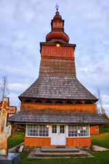 A Glimpse of History: Serene Wooden Church in a Picturesque Ukrainian Village