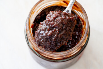 Chocolate Sauce with Cherry Spread in Bowl.