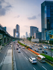 Jakarta, a metropolitan city full of all existing community activities. one of them is enjoying the beauty of the city of jakarta in the afternoon while watching vehicles passing by on the toll road.