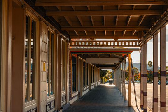 Row of verandahs covering footpath along shopfronts in small regional town