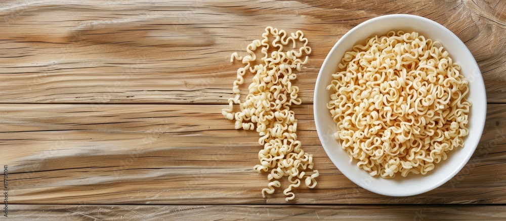 Poster half a plate of instant noodles placed on a wooden table with ample copy space image.