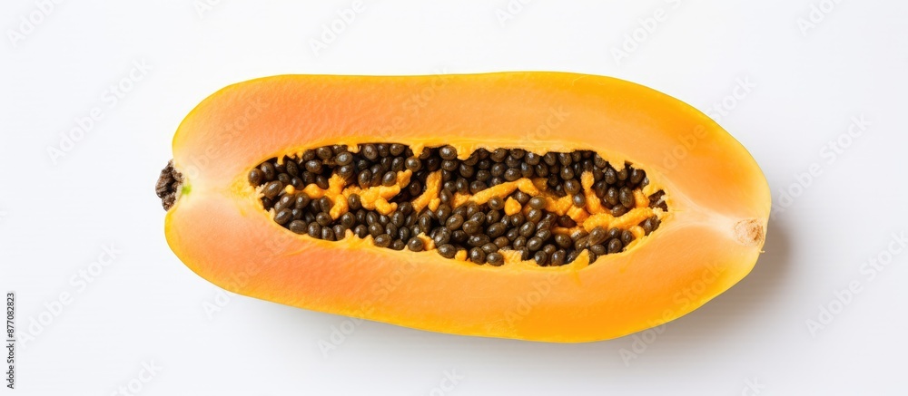 Poster top view of half a ripe papaya on a white background with copy space image included.