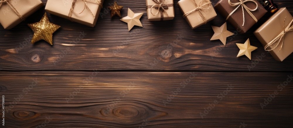 Poster homemade christmas and new year gift boxes with decorations on wooden background for festive holiday