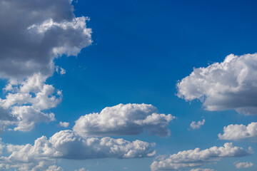 Beautiful blue sky with clouds. Space for advertising. Horizontal.