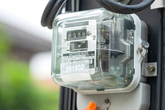 Electric measuring power meter for energy cost at home and office.