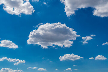 Beautiful blue sky with clouds. Space for advertising. Horizontal.