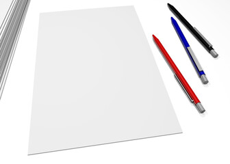 Three pencils on white paper sheet