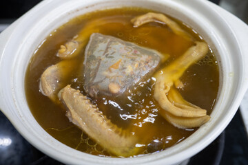 Braised duck feet cooked in casserole