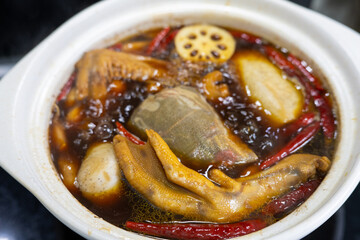 Braised duck feet cooked in casserole