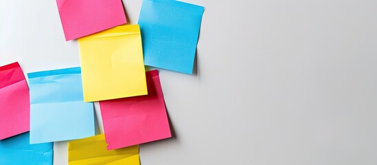 Sticky notes with ample copy space image on a plain white backdrop.