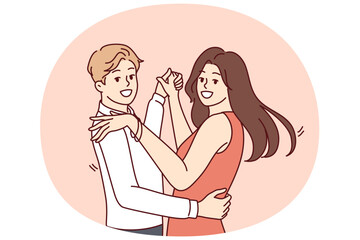 Man and women dancing bachata or salsa wish to become professional latin dancers and embracing partner looking at camera. Happy couple of guys and girls dancing to music in club or on dance floor