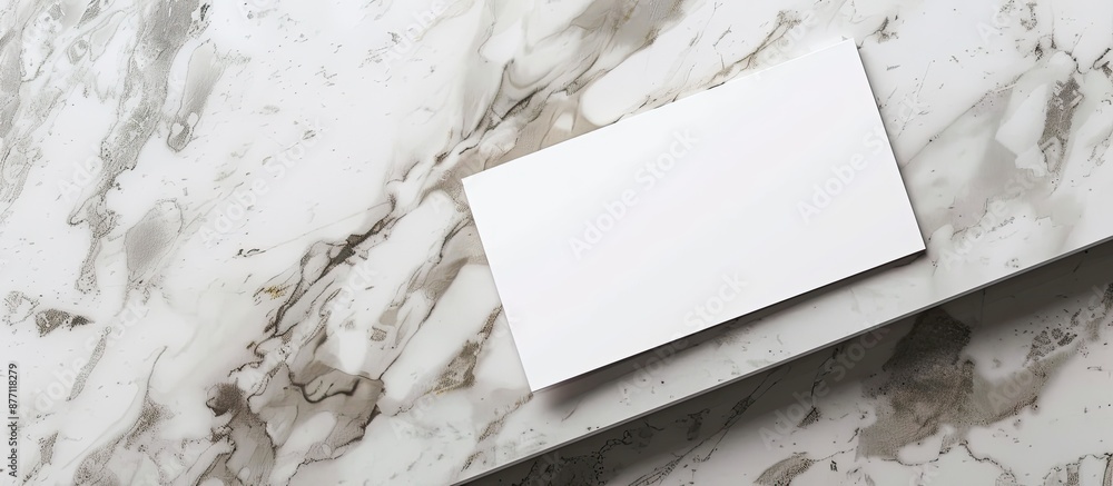 Fototapete Top view of a business card or invitation mockup displayed on a marble table with copy space image.