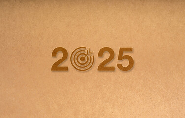 Happy new year 2025 with green business concept banner. 2025 year calendar number with target icon, isolated on brown eco recycle paper background, minimal style banner.